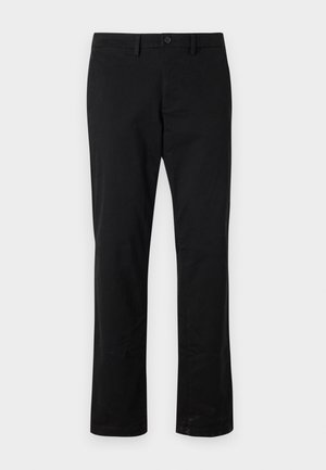 Pantalons droits noirs en coton, avec une fermeture à bouton à l'avant, des poches standard et une texture minimale.