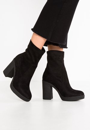 Plateaustøvletter - black