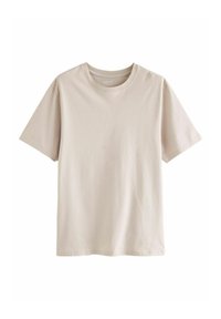 Camiseta de algodón beige clara con mangas cortas y cuello redondo. Textura suave y diseño sencillo, con un pequeño logo en el cuello.