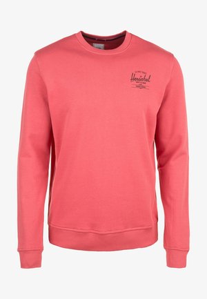Koralfarvet langærmet sweatshirt med rund hals, ribkant ved ærmer og bund, med lille sort "Herschel"-logo på øverste venstre bryst.