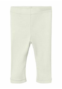 Leggings de bebé de punto acanalado en color beige claro, con cintura elástica y puños de pierna rectos, sobre un fondo blanco.