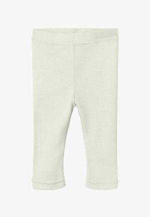 Plain light beige ribbed knit baby leggings with an elastic waistband and straight leg cuffs on a white background.