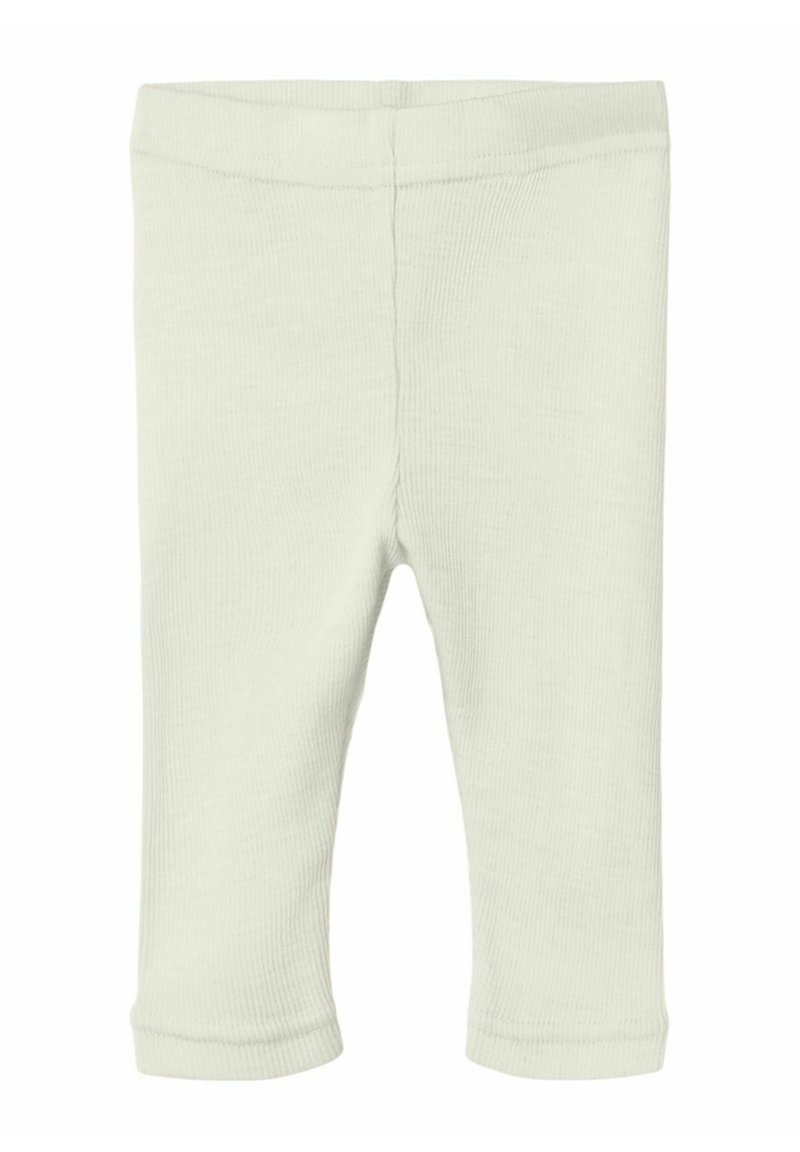 Leggings de bebé de punto acanalado en color beige claro, con cintura elástica y puños de pierna rectos, sobre un fondo blanco.