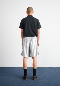 adidas Originals MEGABREAK - Pantaloni sportivi - grey