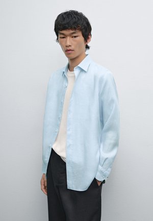 Shirt - mottled light blue