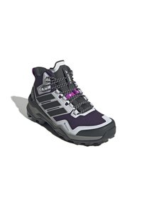 Bottes de randonnée violettes et grises avec un dessus texturé, une coque de protection renforcée et des lacets noirs. Dispose d'une semelle robuste pour une bonne adhérence.