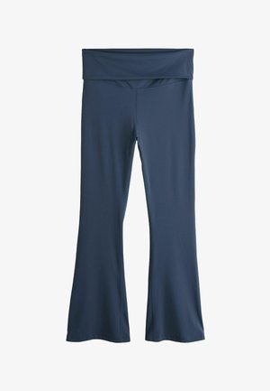 Laivastonsiniset levenevät joogahousut, joissa on leveä, sileä vyötärönauha. Ne on valmistettu joustavasta, kevyestä kankaasta, jossa on siistit linjat eikä näkyviä logoja.