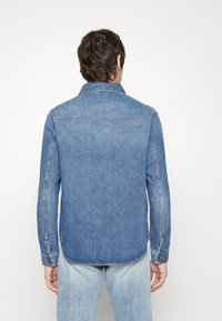 Tiger of Sweden Džínová bunda - blue