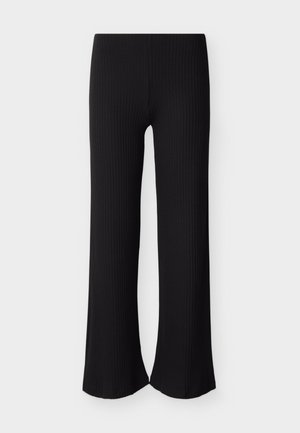Pantalon large noir à côtes avec une surface texturée, présentant une ceinture ajustée et des ourlets évasés pour une coupe décontractée.