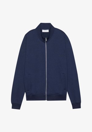 Kék, cipzáras pamutkeverék dzseki, magas nyakkal, oldalzsebekkel, bordázott mandzsettákkal és alsó résszel, finom textúrával és minimalista dizájnnal.