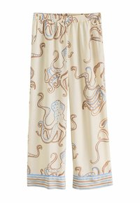 Pantaloni cu croială largă, confecționați dintr-un material moale, având un fundal crem cu un model de caracatiță maro și albastru, și o bordură decorativă albastră la tiv.