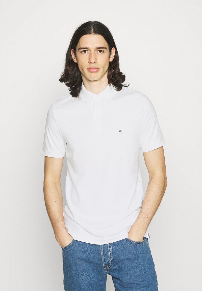 Calvin Klein LIQUID TOUCH SLIM FIT Polo bright white/blanc ZALANDO.FR