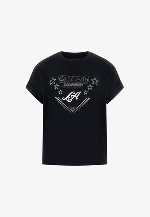 T-shirt di cotone nero con maniche arrotolate, caratterizzata da una stampa grafica bianca con la scritta "GUESS CALIFORNIA" e stelle, al centro con "LA" in un font stilizzato.