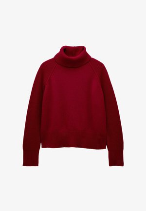 Punane kudumiga kõrge kaelusega särk, millel on pikad varrukad ning soonikääred, -äär ja -krae valgel taustal.