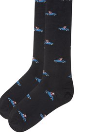 Sorte bomuldsokker med et legende design af små blå biler med en hundefigur, jævnt fordelt over stoffet.