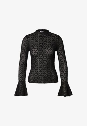 Top negro de manga larga con un patrón transparente de corazones, cuello alto y puños acampanados, que destaca un diseño texturizado y en capas.