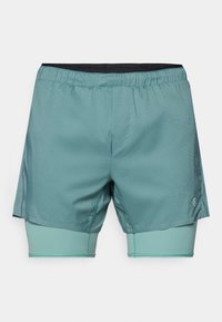 Light teal athletic shorts with a black elastic waistband. Features integrated inner shorts in a lighter teal shade and reflective accents.