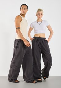 YOURTURN by Zalando UNISEX - Joggebukse - dark grey
