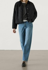 Massimo Dutti Winterjacke - black