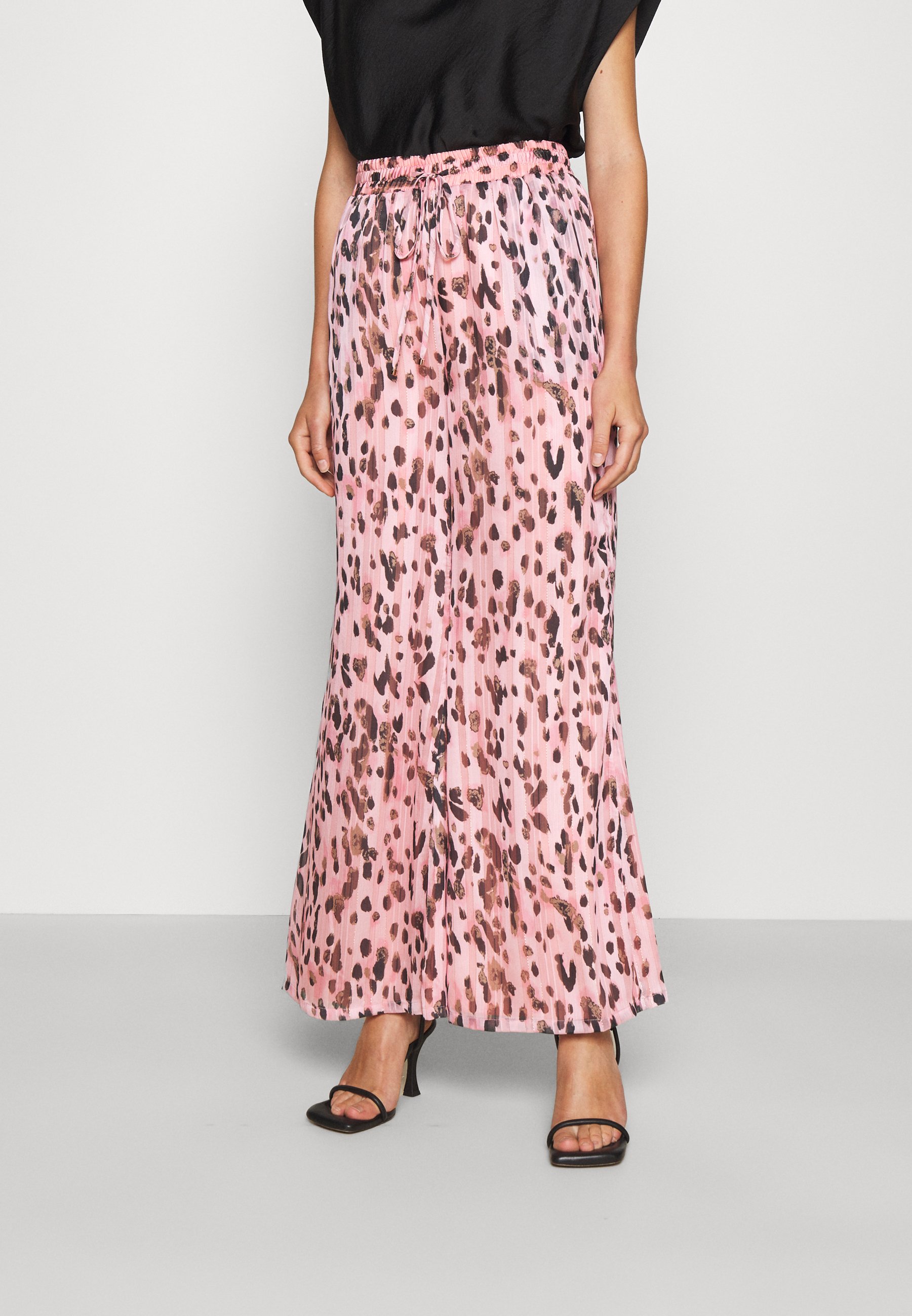 pink vans with leopard print stripe