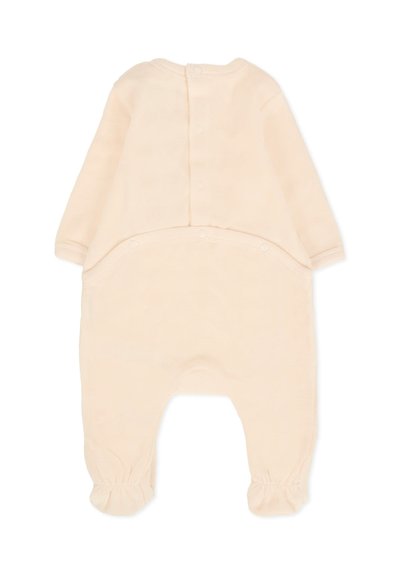 Body in un morbido tessuto rosa pallido, con maniche lunghe, chiusura a bottoni a pressione sul retro e polsini arricciati alla caviglia.
