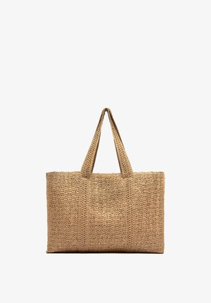 Sac cabas rectangulaire tissé en paille avec deux anses, présentant un motif tressé texturé de couleur beige naturel.