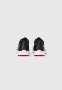 Black sports shoes with a smooth texture, featuring a white midsole and pink outsole, designed for comfort and performance.