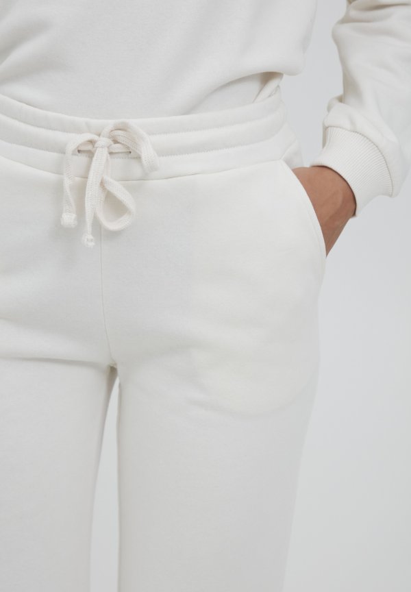 BYSAMMIA - Tracksuit bottoms - birch4