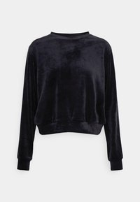 Svart kort sweatshirt i mjuk, sammetliknande tyg. Har långa ärmar och en enkel rund halsringning. Inga mönster eller dekorationer.