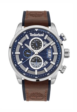 Montre chronographe Timberland avec un boîtier en acier inoxydable, un cadran bleu, un bracelet en cuir brun et des accents argentés. Comprend trois sous-cadrans.