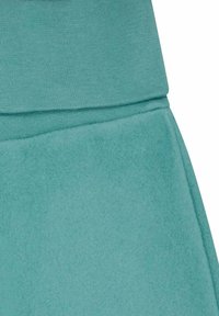 Türkisfarbene Sweatpants mit glatter Stofftextur und geripptem Bund. Sie verfügen über ein flaches Design und vertikale Nähte an den Seiten.