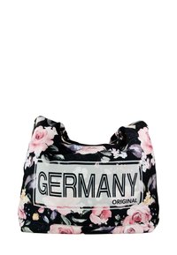 Zwarte stoffen tas met bloemenpatroon met roze rozen en witte accenten, voorzien van een groot "GERMANY ORIGINAL" label in het midden. Zachte textuur, relaxte vorm.