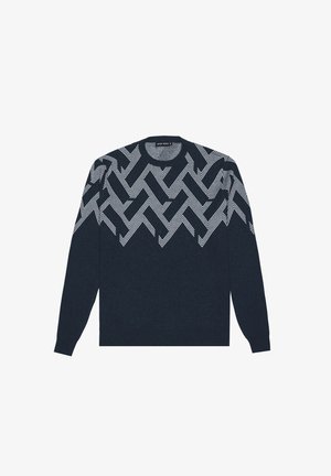 Marineblauer Pullover mit langen Ärmeln, weißem Zickzack- und gestreiftem Chevron-Muster über Brust und Schultern, Rundhalsausschnitt.