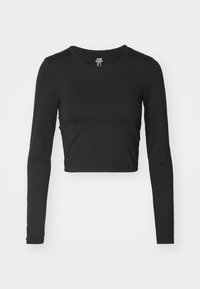 Zwarte langemouwen cropped top van glad, rekbaar stof. Heeft een ronde halslijn en een aansluitend ontwerp met minimale stikdetails.