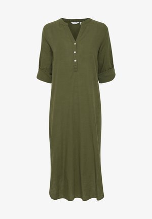 Abito in lino verde oliva con scollo a V, tre bottoni e maniche arrotolate. Forma fluida, lunghezza al ginocchio, texture morbida.