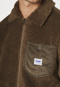 Lee UNISEX brązowy