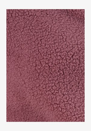 Texture de tissu mauve avec une apparence douce et fluffy. La surface présente un poil dense avec un motif légèrement irrégulier.