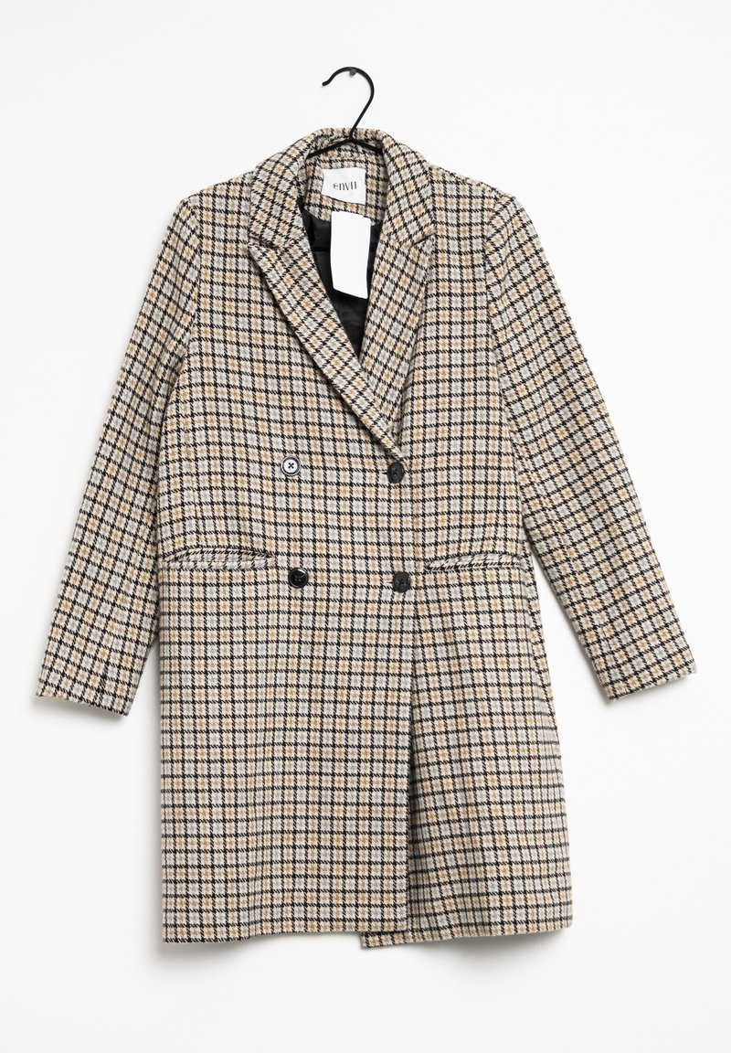 Manteau croisé à motif à carreaux beige et noir, fabriqué à partir d'un tissu texturé. Doté de deux boutons et d'un col cranté.