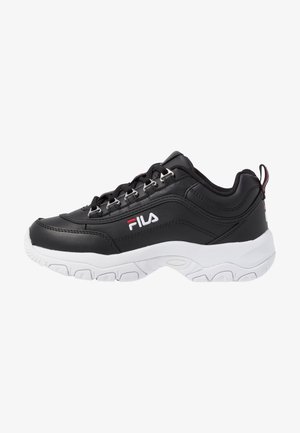 Black athletic shoes with synthetic leather upper, white rubber sole, lace-up design, and red and white accents. Features a padded collar.