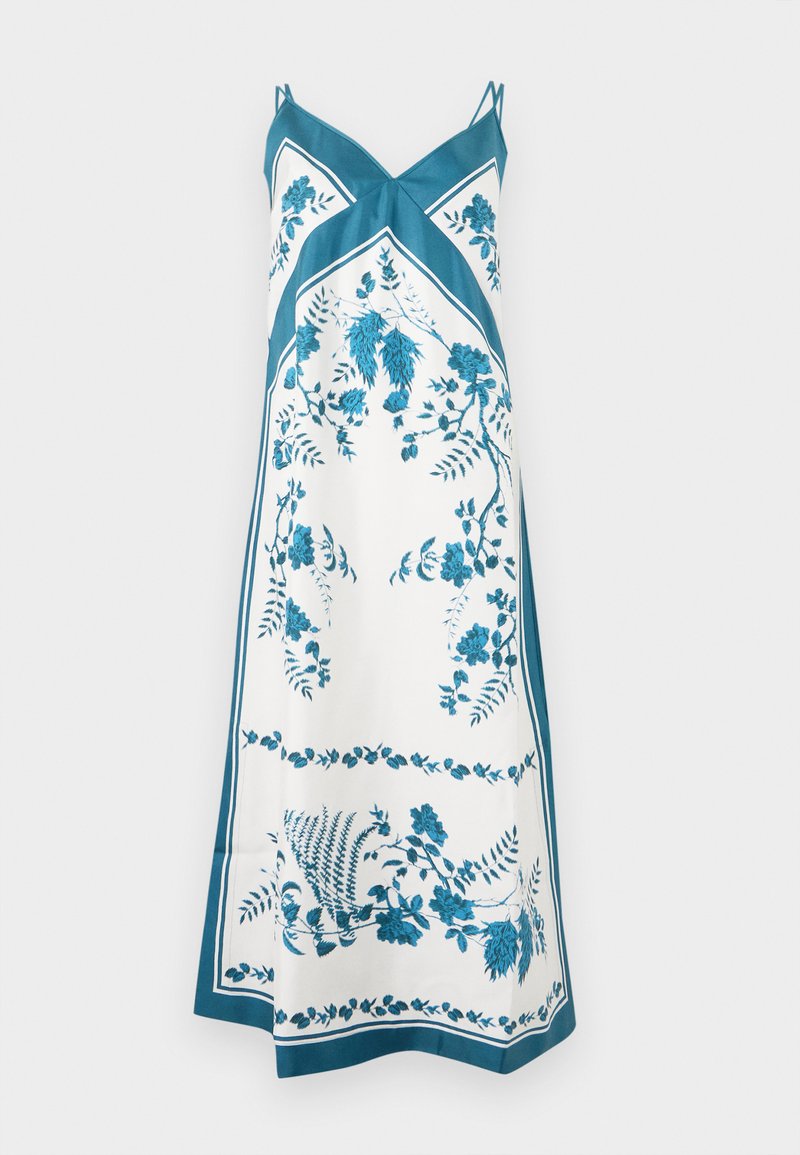 White slip dress with teal floral print, V-neck, and thin double shoulder straps, featuring a bordered pattern and ankle-length hem.