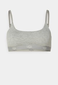 Siva bralet s podesivim trakama i mekim teksturom. Ima sivi pojas s UGG logotipom otisnutim u svjetlije sivoj boji.