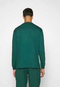 New Balance Långärmad tröja - dark green