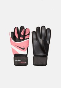 Guanti da portiere rosa e neri con palmo testurizzato, design con dita rinforzate, cinturino elastico al polso e dettaglio del logo Nike bianco.