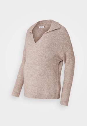 Gai beigtas, adīts džemperis ar V veida kakla izgriezumu un apkakli. Mīksta tekstūra, garas piedurknes, brīvs piegriezums un ribota apakšmala.