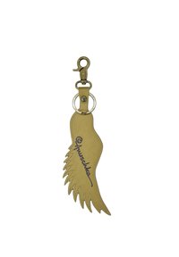 Gold leather keychain shaped like a wing, featuring a textured design and a black signature. Includes a metal clip and ring attachment.
