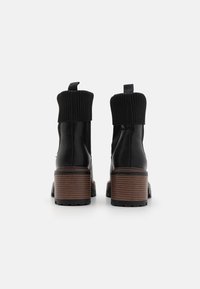 Anna Field Botines con plataforma - black