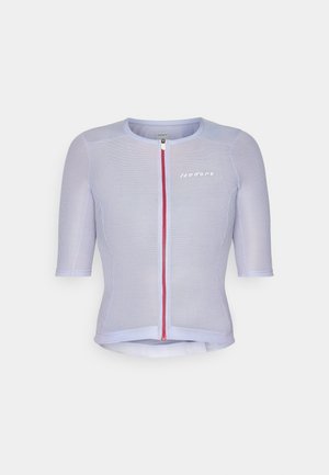 Light purple fitted short-sleeve top with a red zipper. Features textured fabric, ribbed pattern, and "isadore" logo on the front.