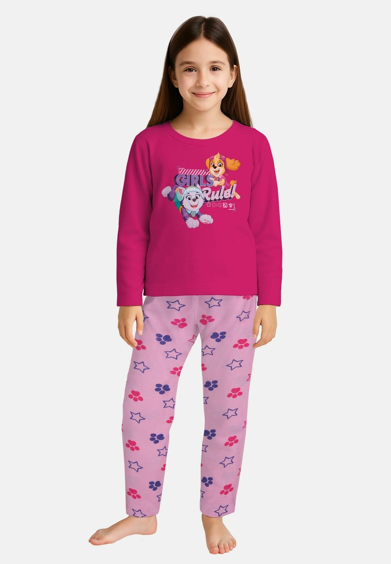 Maglietta da pigiama rosa a maniche lunghe con personaggi dei cartoni animati e testo "Le ragazze comandano!". Pantaloni rosa con stelline blu e viola e motivi di impronte di zampe.