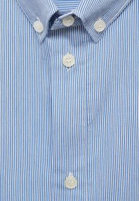 Blue and white striped button-up shirt made of cotton, featuring a spread collar and white plastic buttons. Vertical stripes are evenly spaced.