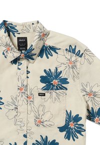 Short-sleeve button-up shirt in light beige with blue and orange floral patterns; includes a chest pocket and RVCA logo on the pocket.